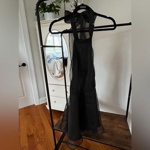 Halter top black dress with tie back, tulle skirt, and zipper on side